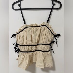 Cream Top with black velvet trim and side bows